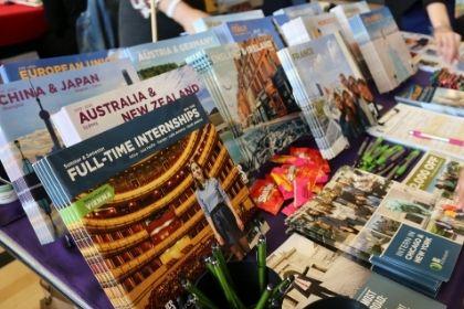 Study Abroad brochures on a table at a fair