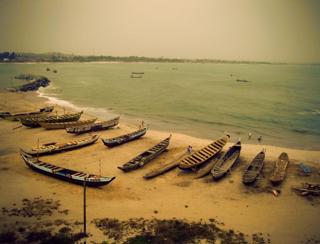 Boats on the shore near Elmina Castle in Ghana