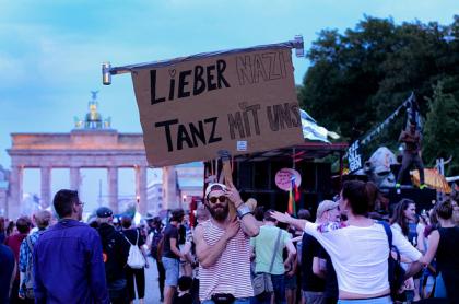 Berliners of all ages counter protesting against anti-immigration right wing protesters using club music, music that Berlin is well known for.