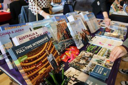 A table with books on it regarding travel