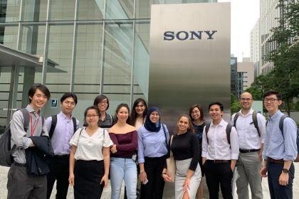 Students in front of Sony building