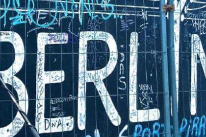 Graffiti on public wall that say "Berlin".