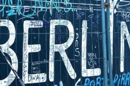 Graffiti on public wall that say "Berlin".