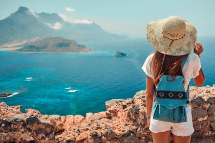 a student with their back to the camera looking at an island