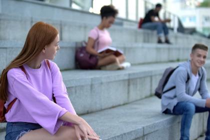 Students sitting on steps