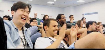 Still of students laughing in classroom