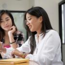 Two students looking at computer screen